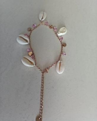 Bracciale con perline rosa e conchiglie 