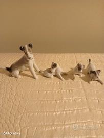 Cane Fox terrier con cuccioli in porcellana 