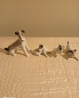 Cane Fox terrier con cuccioli in porcellana 