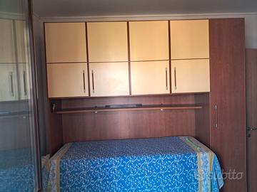 Cameretta matrimoniale a ponte con 2 reti singole