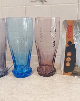 4 bicchieri coca cola  di cui uno edizione  mc