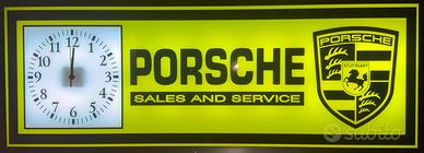 Insegna luminosa Porsche con orologio
