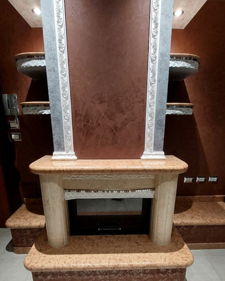 Rivestimento camino in pregiato Marmo Fontana Rosa