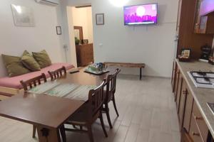 Bilocale con GIARDINO e BOX