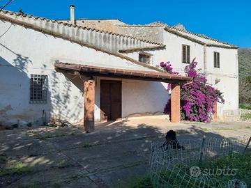 Casa e terreno