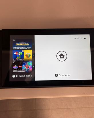 Nintendo Switch (Modello 1) - come nuova + 4 gioch