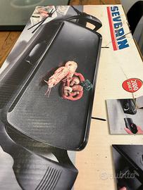 Piastra elettrica , per carme , pesce  verdure