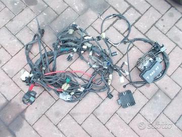 T-Max 500 08-11: regolatore sella freccia faro abs