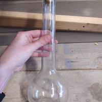 bottiglia in vetro vintage a forma di ampolla
