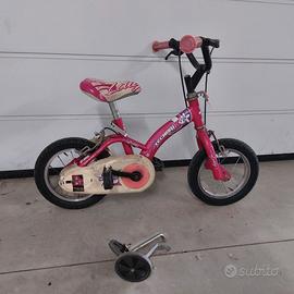 Bicicletta 3/4 anni,,bambina  con pedali e rotelle