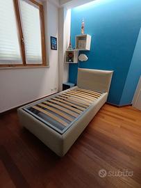Letto singolo in simil pelle, con cassettone 