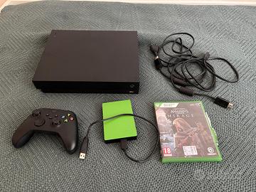 Xbox One X completa con controller e hard disk