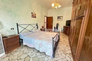 TIRLOCALE IN CENTRO CON BALCONE GARAGE E SOFFITTA