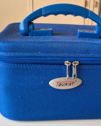 Beauty case rigido blu con manico e doppia zip 