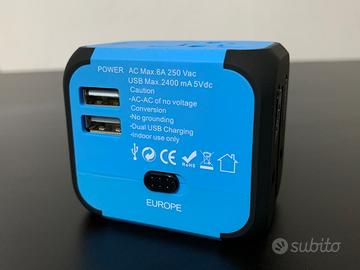 Adattatore da viaggio multi (EU/UK/USA/AUST) + USB