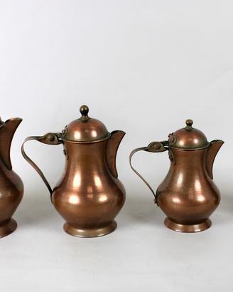 Serie di bricchetti in rame con coperchio