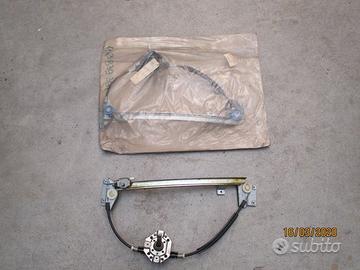 Alzacristalli post. audi 100