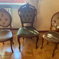 Sedie e divano in velluto e legno