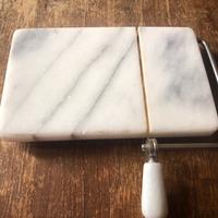 Tagliere per formaggi in marmo e acciao