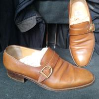 Scarpe in pelle con fibia