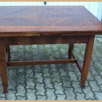 Tavolo in noce massello a tiro restaurato