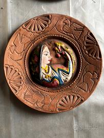 Piatti decorativi sardi in terracotta
