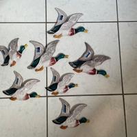 Paperelle/anatre da parete in ceramica