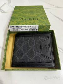 Portafoglio Gucci uomo bifold motivo GG