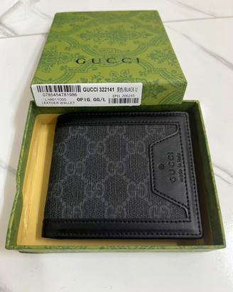 Portafoglio Gucci uomo bifold motivo GG