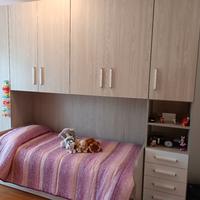 Camera a ponte con altro letto contenitore 