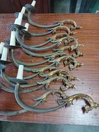 bracci in ottone
