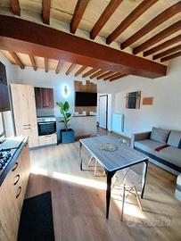 Appartamento affitti brevi, con padel e bici
