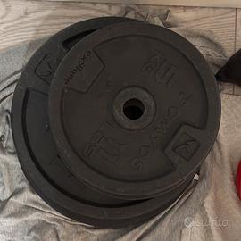 set dischi ghisa: 4 da 5kg + 2 da 10 kg
