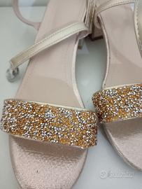 Scarpe nuove dorate n. 38