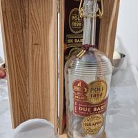 bottiglia grappa vuota poli due barili