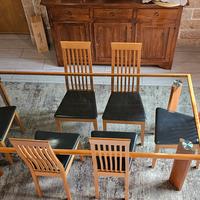 tavolo in cristallo con sedie