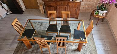 tavolo in cristallo con sedie