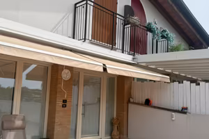 Casa con giardino