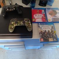 Console Ps4 + 2 controller + 3 giochi