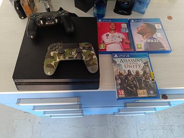 Console Ps4 + 2 controller + 3 giochi