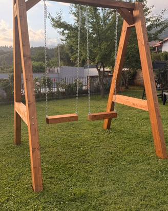 Altalena per bambini in legno lamellare