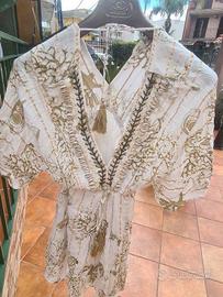 vestitino estivo con le attaccature di conchiglie