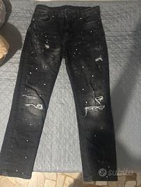 Jeans nero strappato slim fit