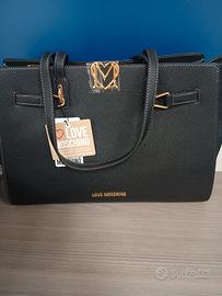 Borsa Moschino nera  con inserti dorati