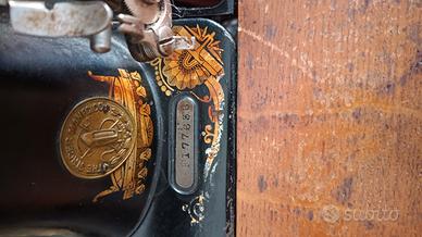 arredamento più macchina da cucire Singer del 1911