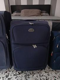 Set di tre valigie "trolley"