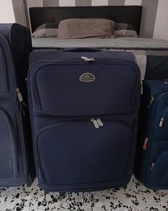 Set di tre valigie "trolley"