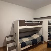 Camera completa con letti a castello a scorrimento