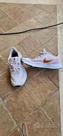 Nike Revolution 5 rosa-bronzo