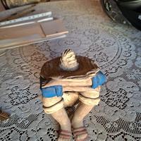 Scultura di un uomo che dorme